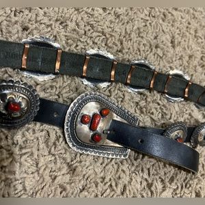 Black leather belt with conchos and red accent